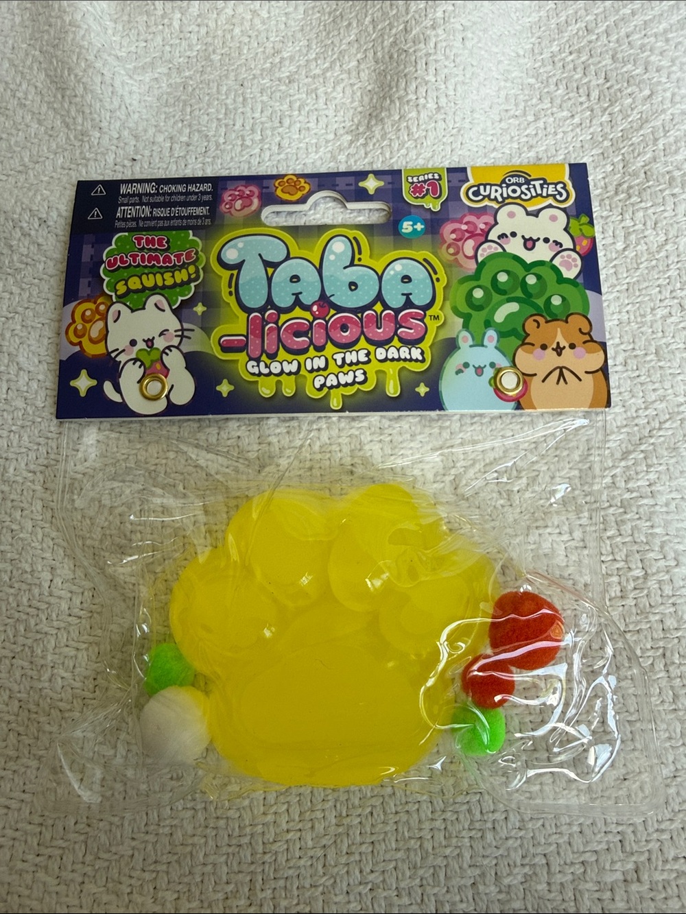 Taba-licious Glow-in-the-Dark Paw Squishy Toy - Yellow (Five Below)